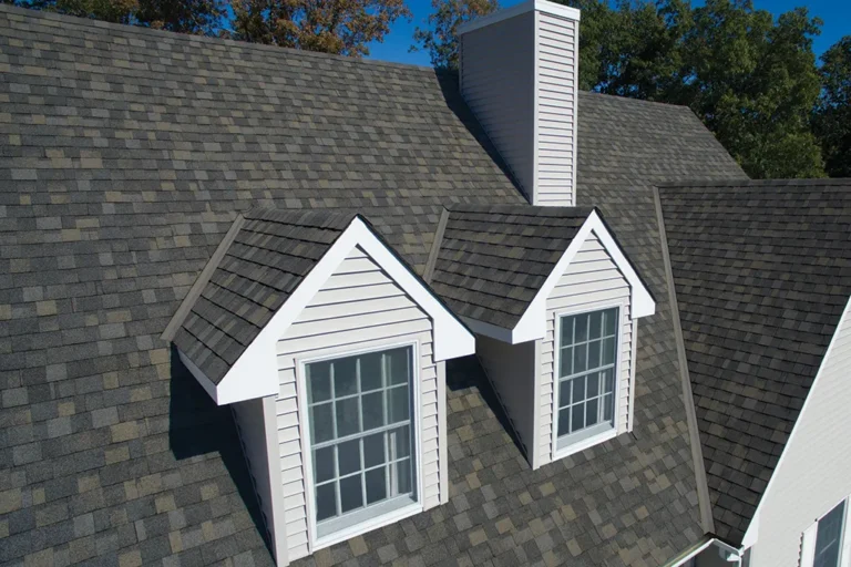 roof with dormers and shingles