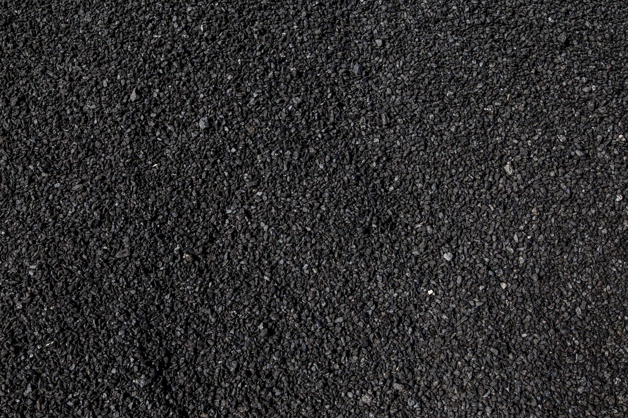 close-up view of black granules on a shingle