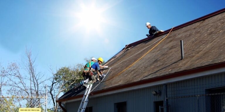 contractors working on a sloped roof