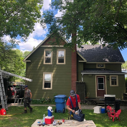 roofers-working-on-house