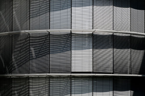 sun shades as part of fenestration system of an office building