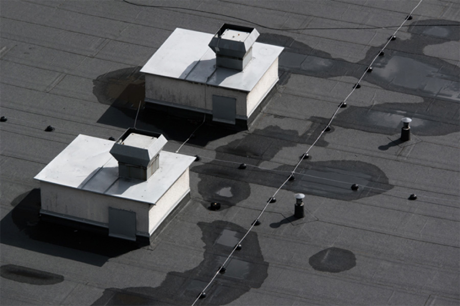 water ponding on Commercial Roof 