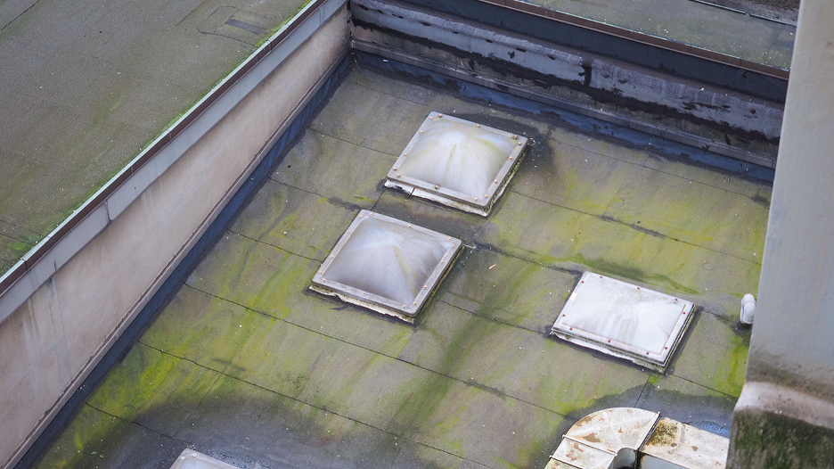 repair commercial flat roof in winter