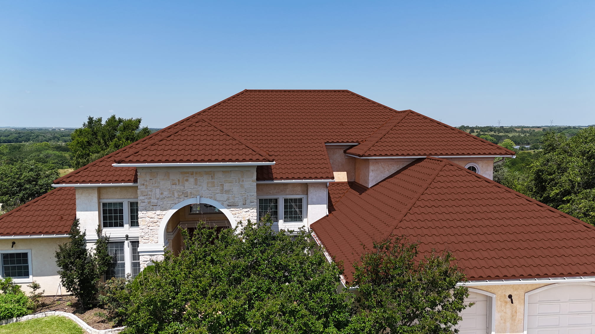 DECRA Spanish Tile Canyon Terra roof in stone-coated steel, Mediterranean barrel profile with durable, hail-resistant finish