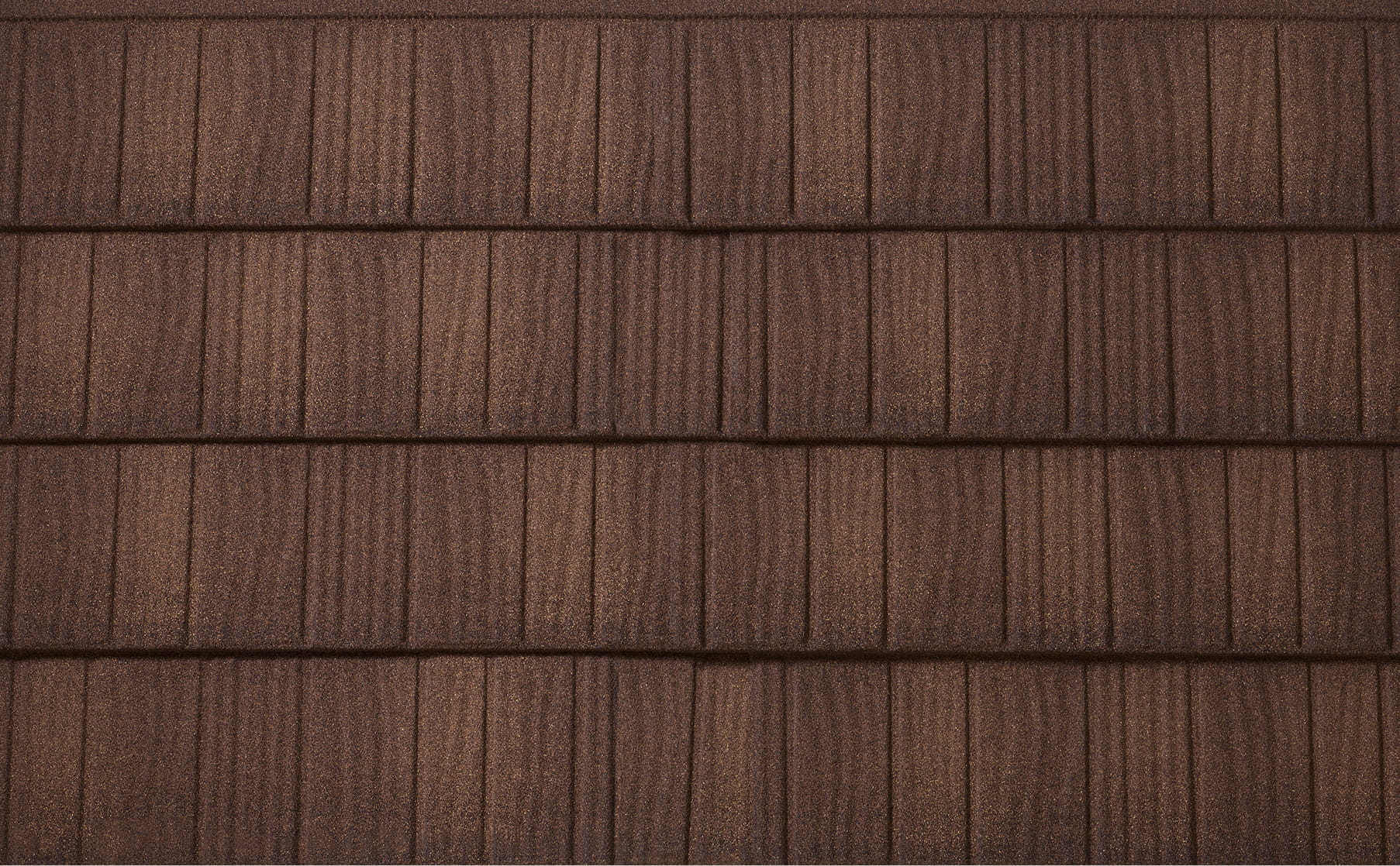 DECRA Farmhouse Shake Finished Oak stone-coated steel roofing swatch showing brown textured cedar shake look with granules