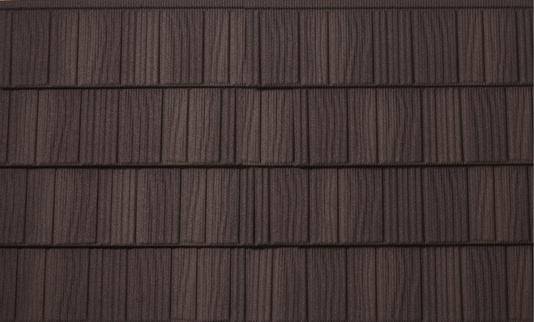 DECRA Farmhouse Shake walnut stone-coated steel roofing swatch showing textured brown shake profile for durable curb appeal