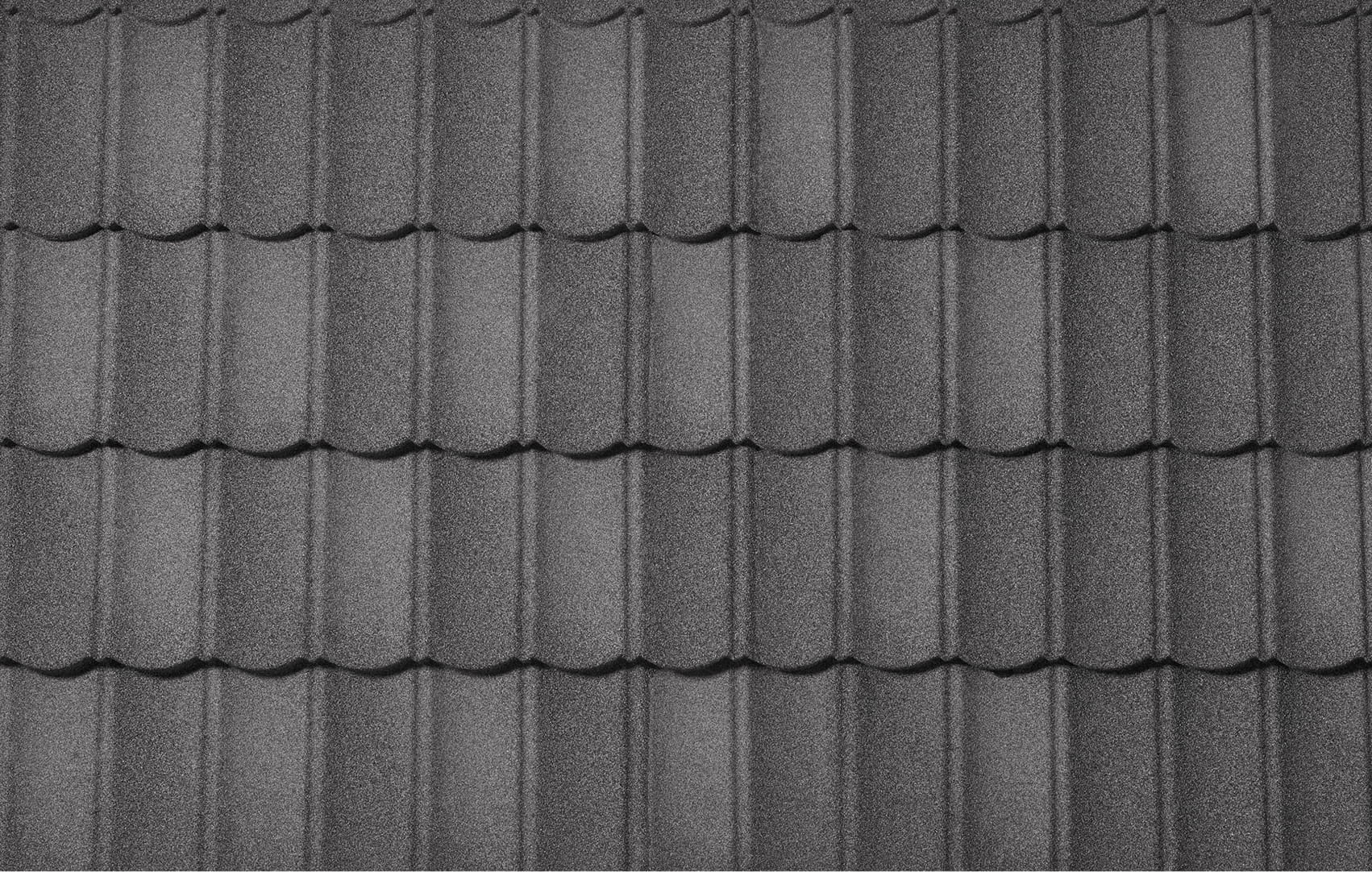 Close-up of DECRA Scalloped Tile Mediterranean roof in Cathedral Stone stone-coated steel with granular texture