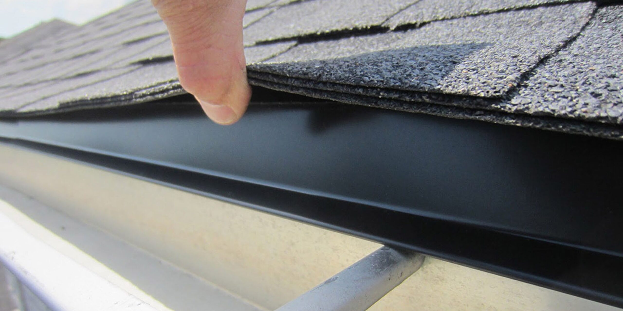 drip edge and shingles at an eave