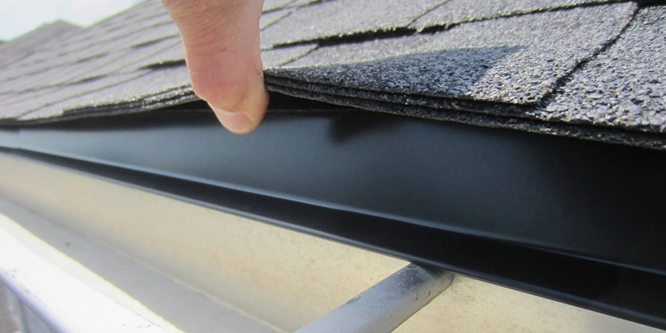 drip edge and shingles at an eave