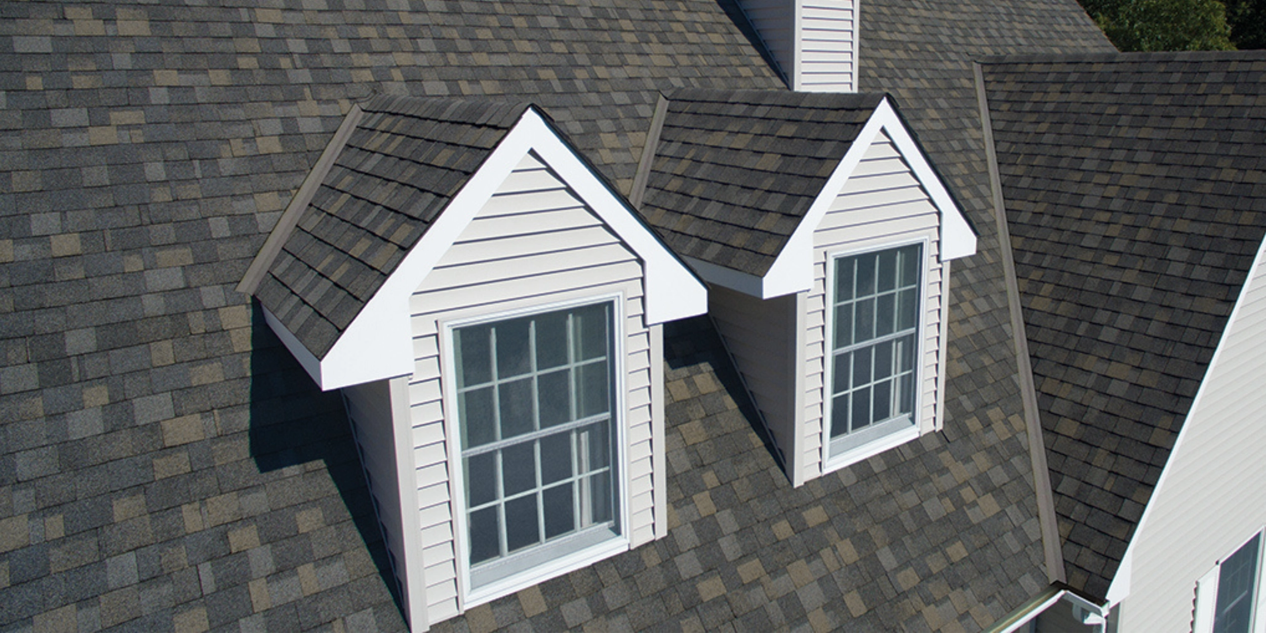 roof with dormer and shingles