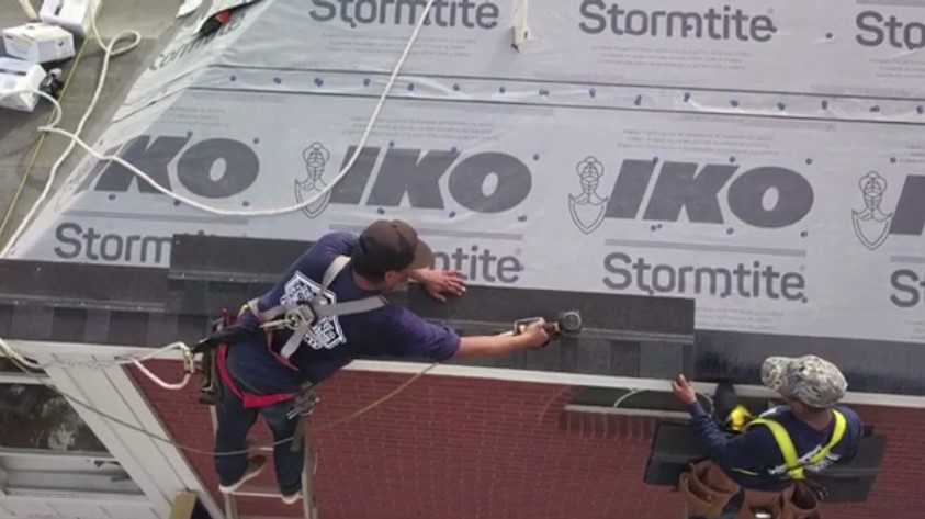 roofers installing shingle roof