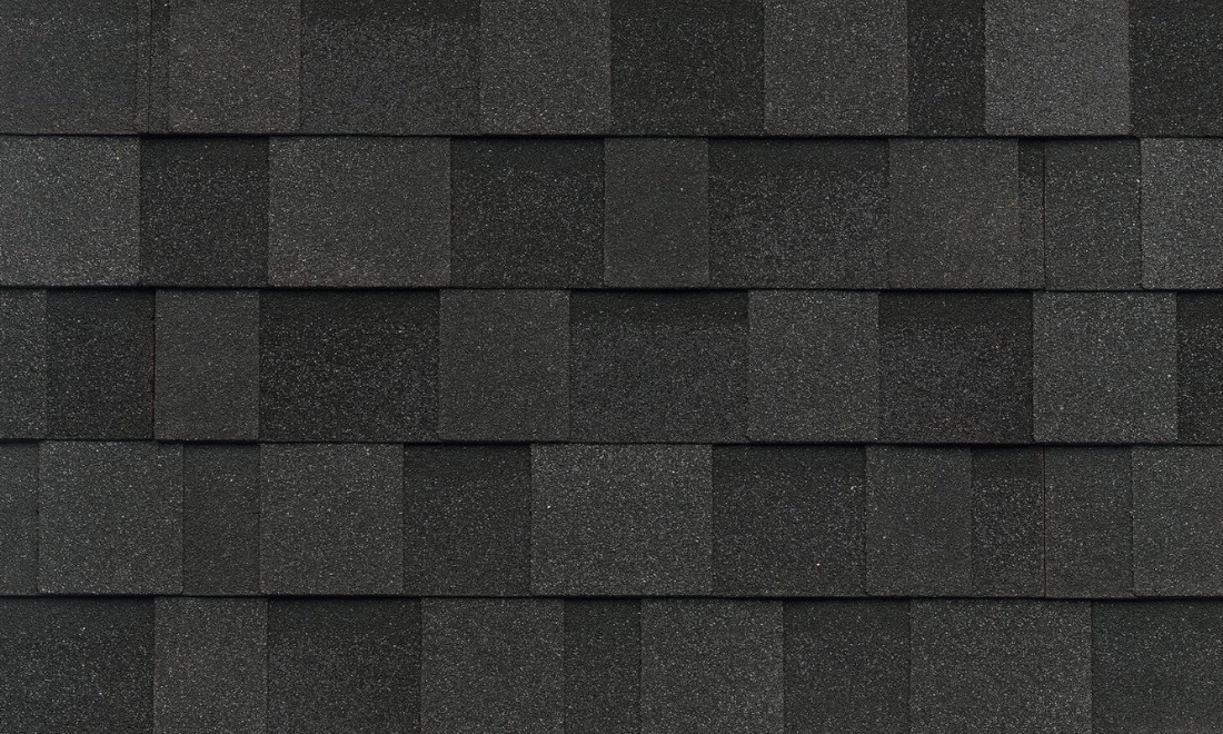 IKO Blackstone shingle swatch showing refined deep black tone with subtle contrast