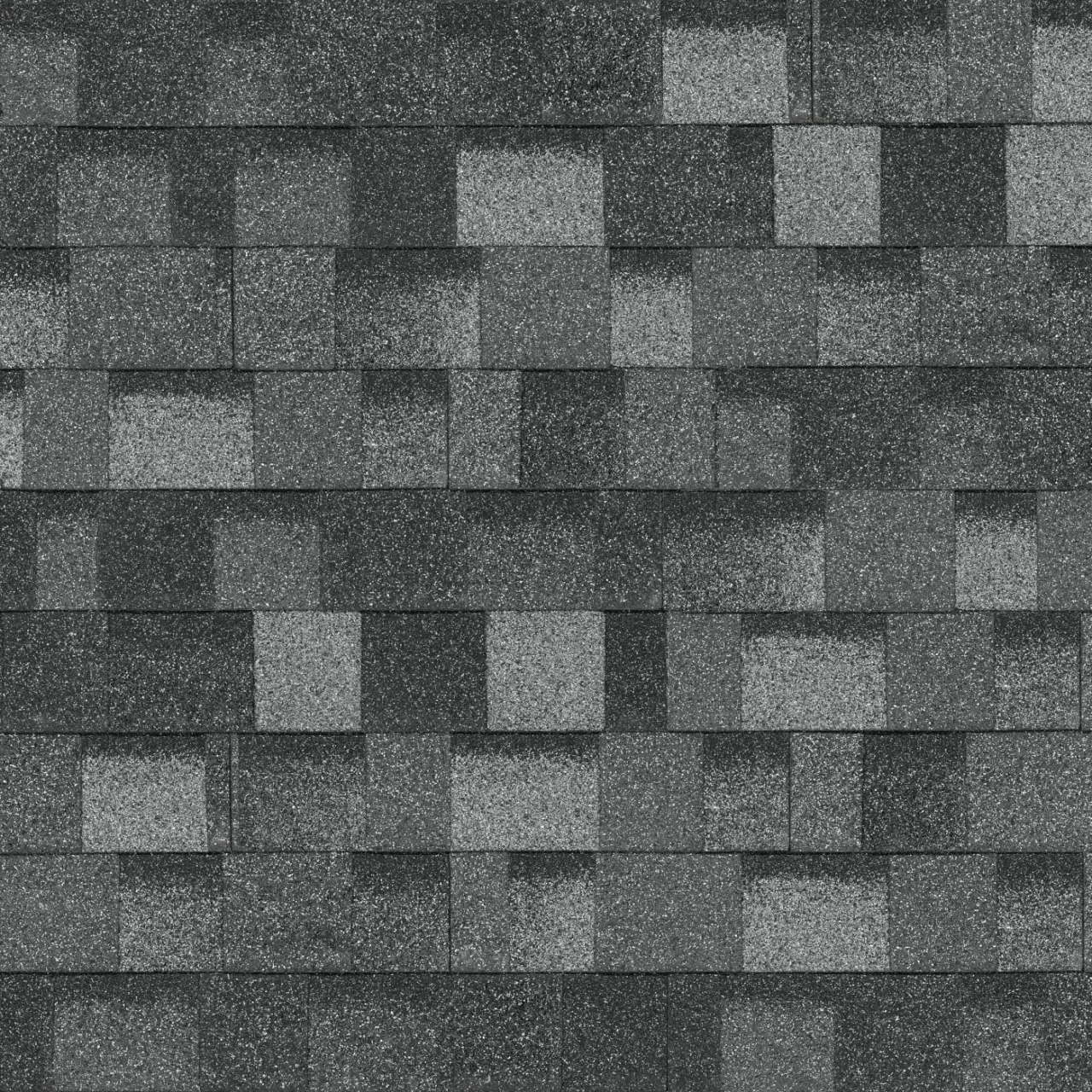 Vue rapprochée d'une toiture couverte de bardeaux d'asphalte Summit Grey, disposés en un motif décalé d'inspiration Nordic.