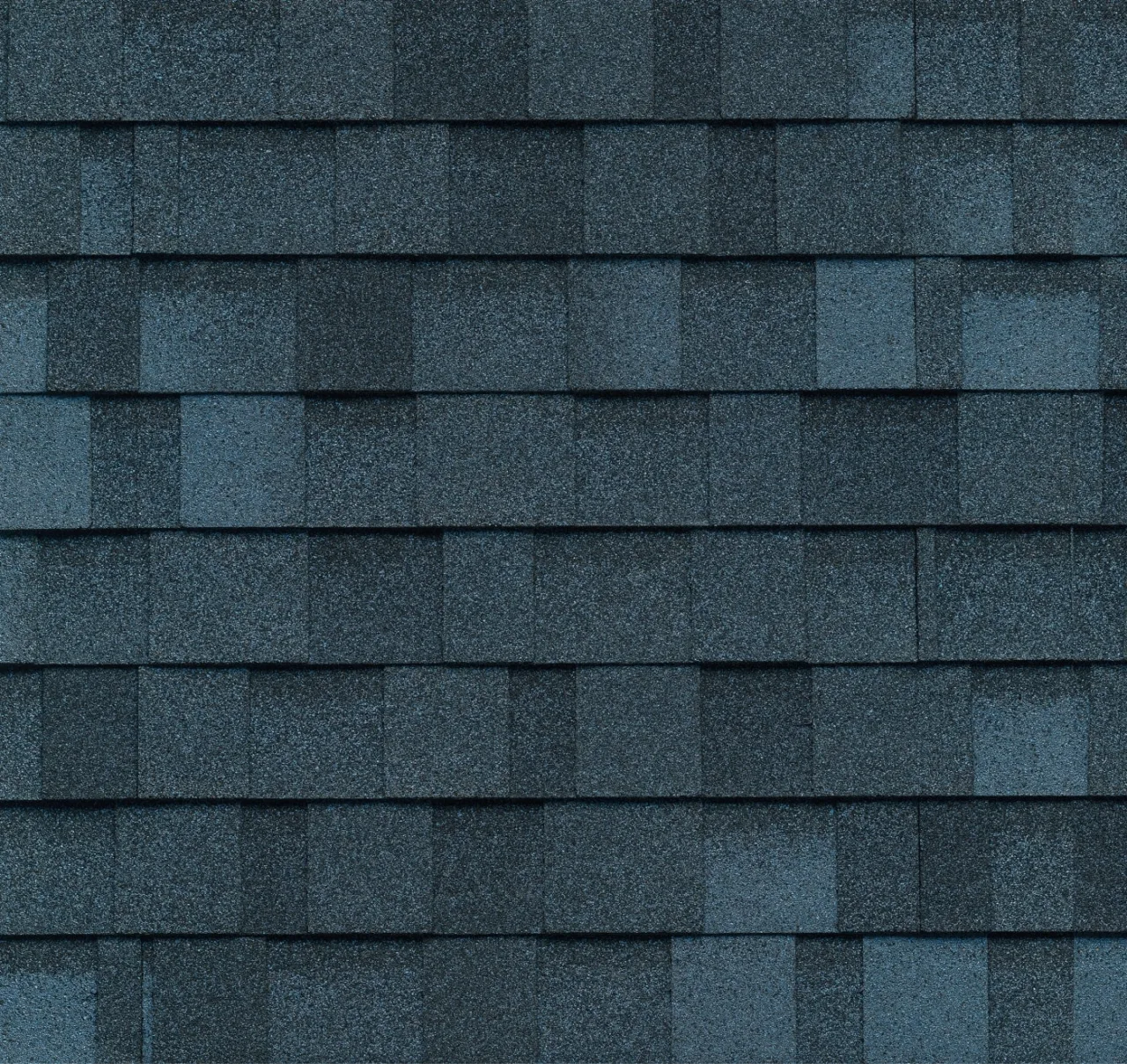Close-up of a textured Atlantic Blue asphalt shingle roof with a Dynasty-inspired repeating pattern.