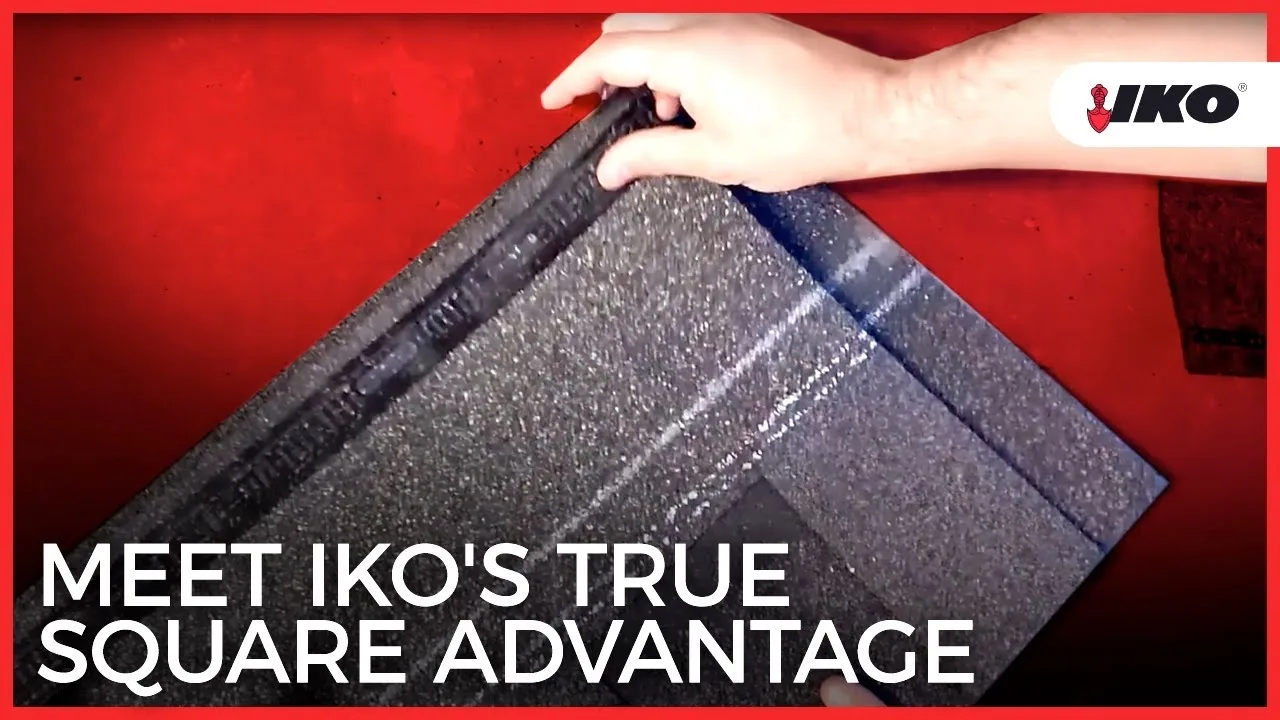 Hands carefully handling a shingle with a textured surface, showcasing IKO's True Square Advantage. Text on image: "Discover IKO's Shingle Size Precision." IKO logo in the top right corner.