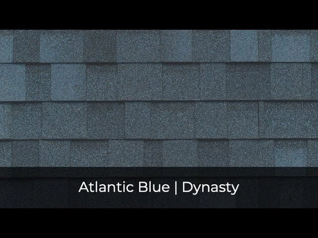 Dark blue roofing shingles with a textured pattern from the IKO Roof Shingle Colors collection. Text reads: "Atlantic Blue | Dynasty.