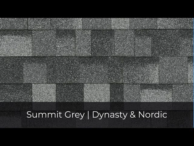 Roof shingles in a striking blend of dark and light grey tones, known as "Summit Grey," are part of the IKO Roof Shingle Colors collection, specifically from the Dynasty & Nordic line.