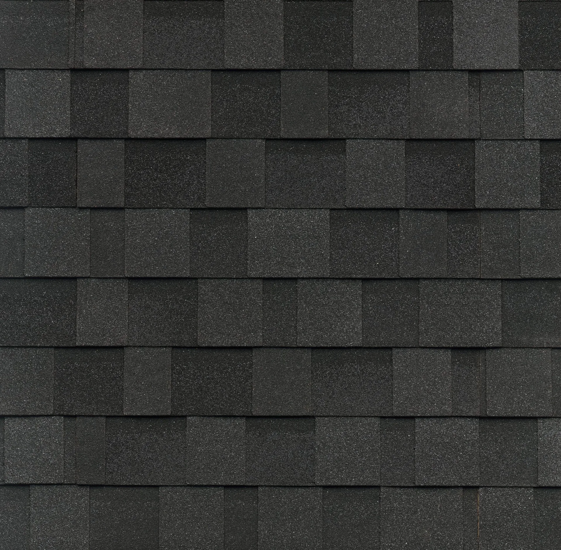 IKO Blackstone shingle swatch showing refined deep black tone with subtle contrast