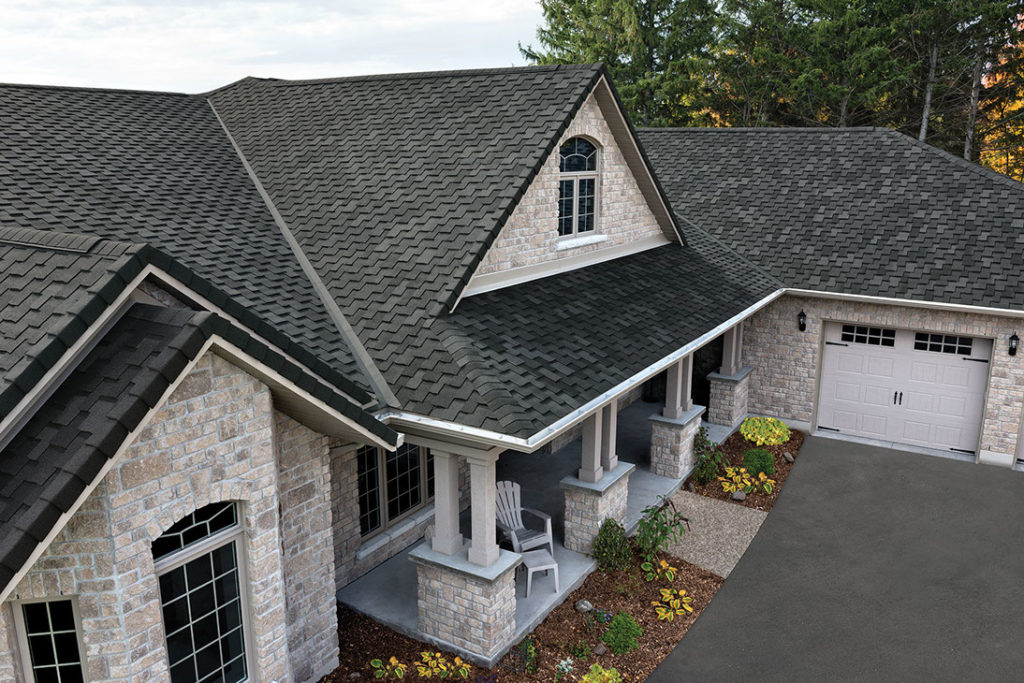 House with dark roofing shingles