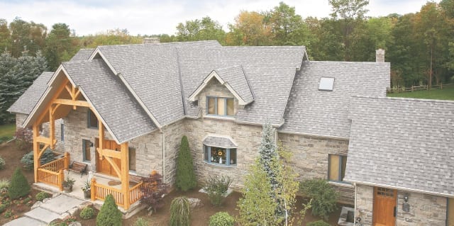 home with architectural roof shingles