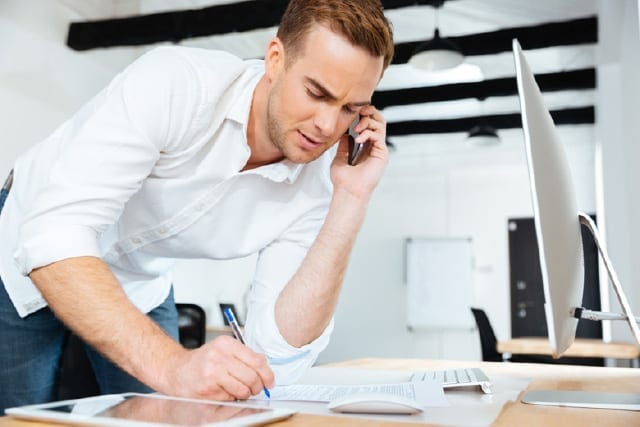 person calling a roofer