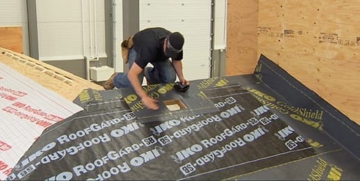 roofer installing IKO GoldShield