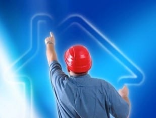 roofer pointing at chimney area of home outline