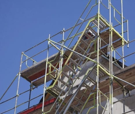 walk up scaffolding installed next to a home