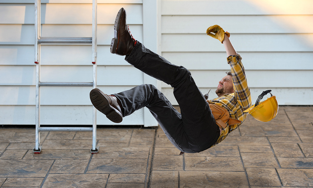 man falling off of roof