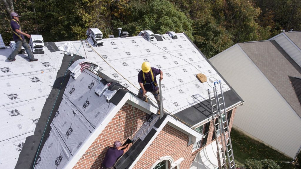 How to Properly Stack Asphalt Shingles on a Pitched Roof – IKO How To Stack Shingles On A Roof