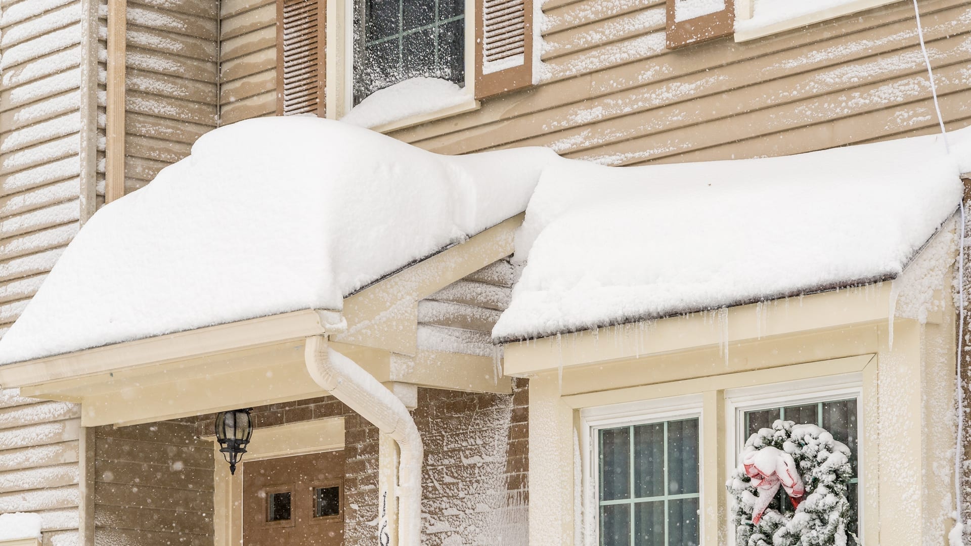 residential house porch roof covered with snow
