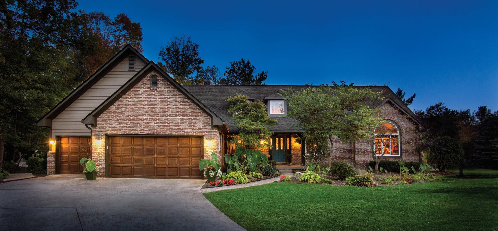 front view of estate home with an IKO Dynasty Glacier roof