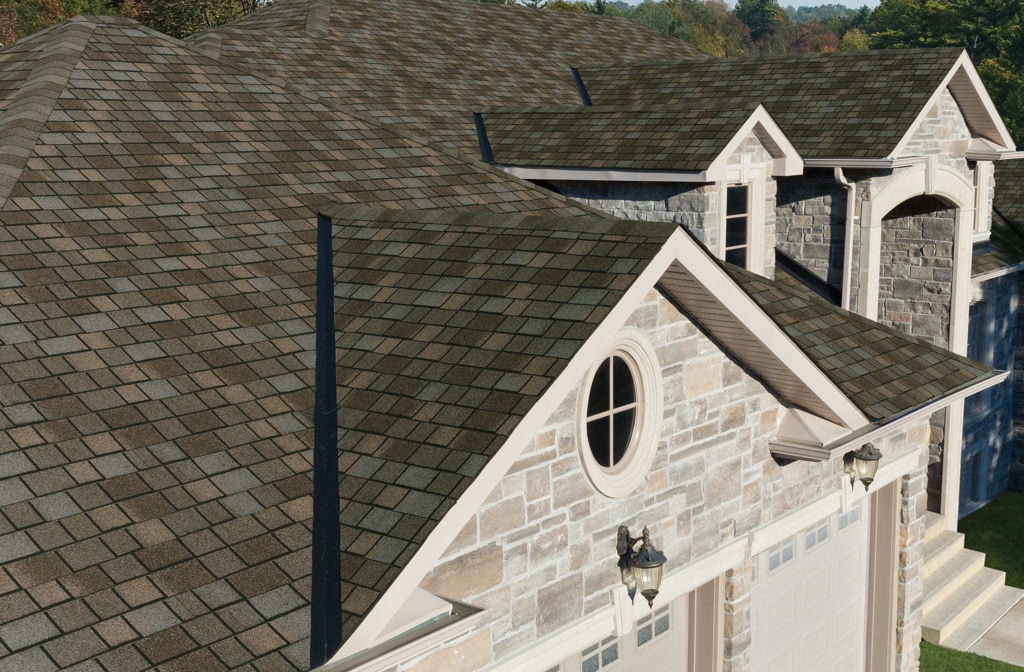IKO Royal Estate Harvest Slate shingles on a roof with three gable sections