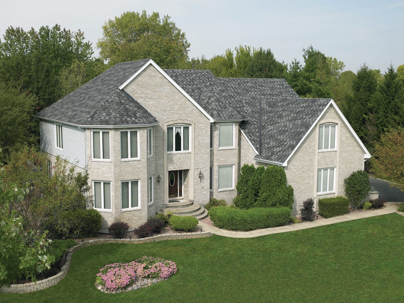 desert beige siding matched with grey asphalt shingles