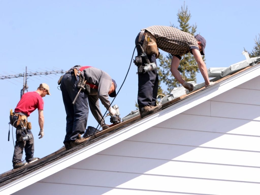 roofers reparing a Damaged Roof