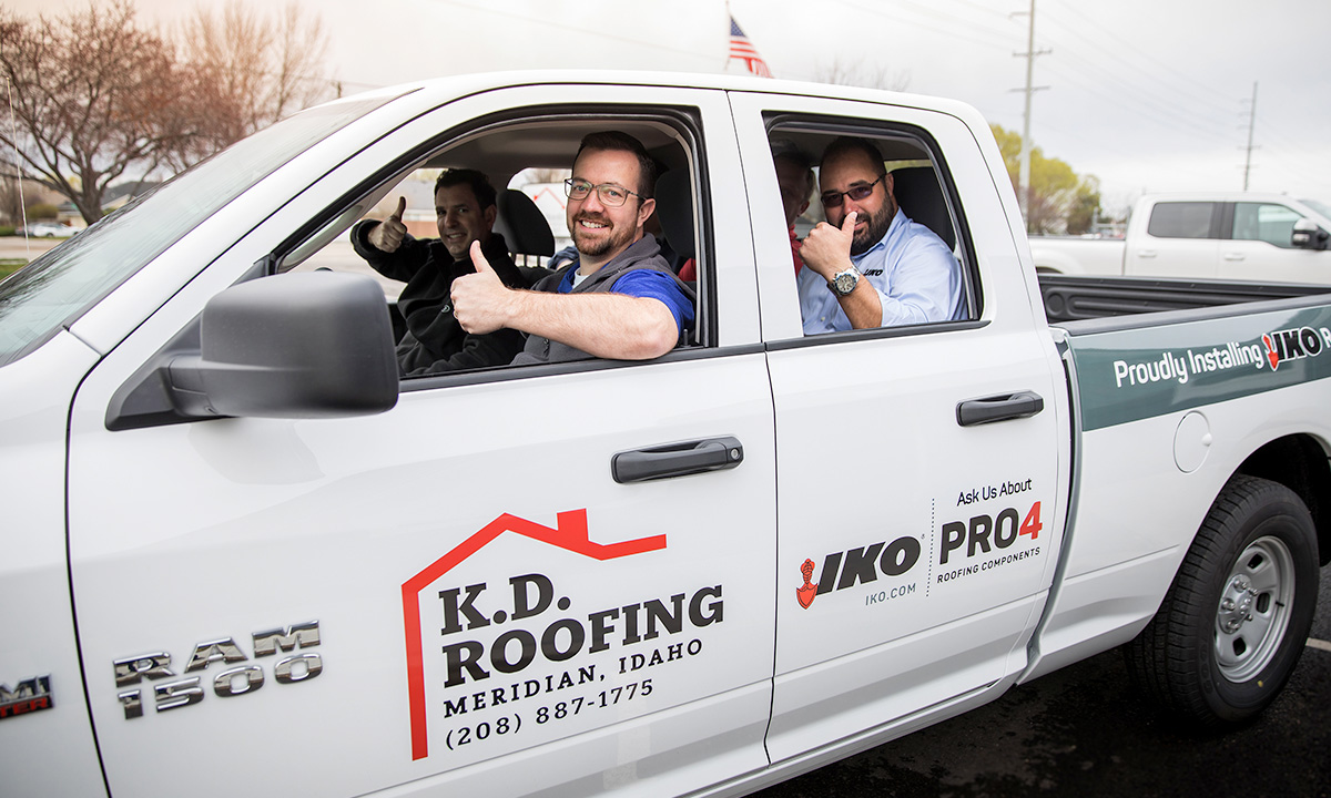 roofers in a pickup truck