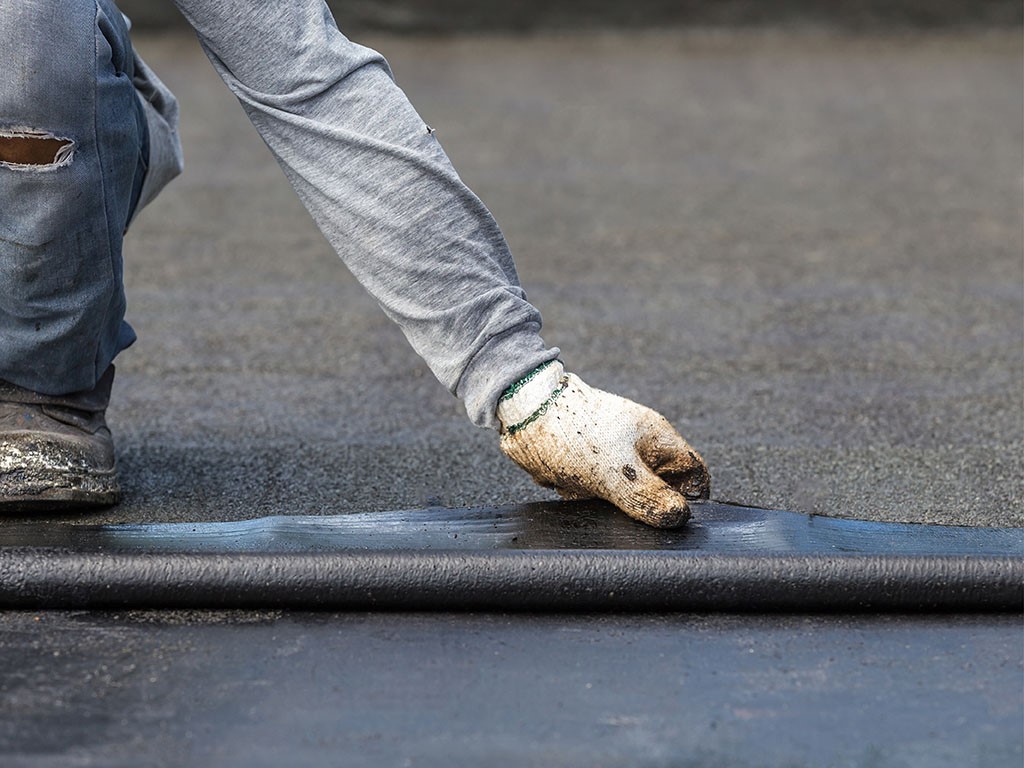 flat roof installation to connect to shingle roof