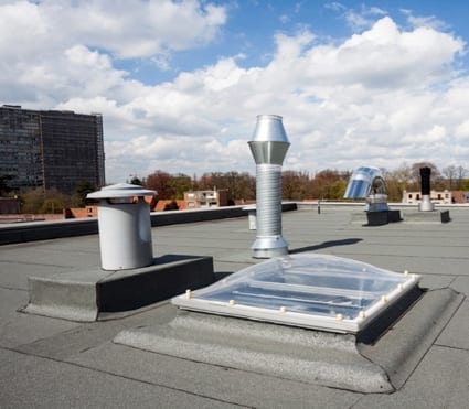 skylight and other penetrations on a flat roof