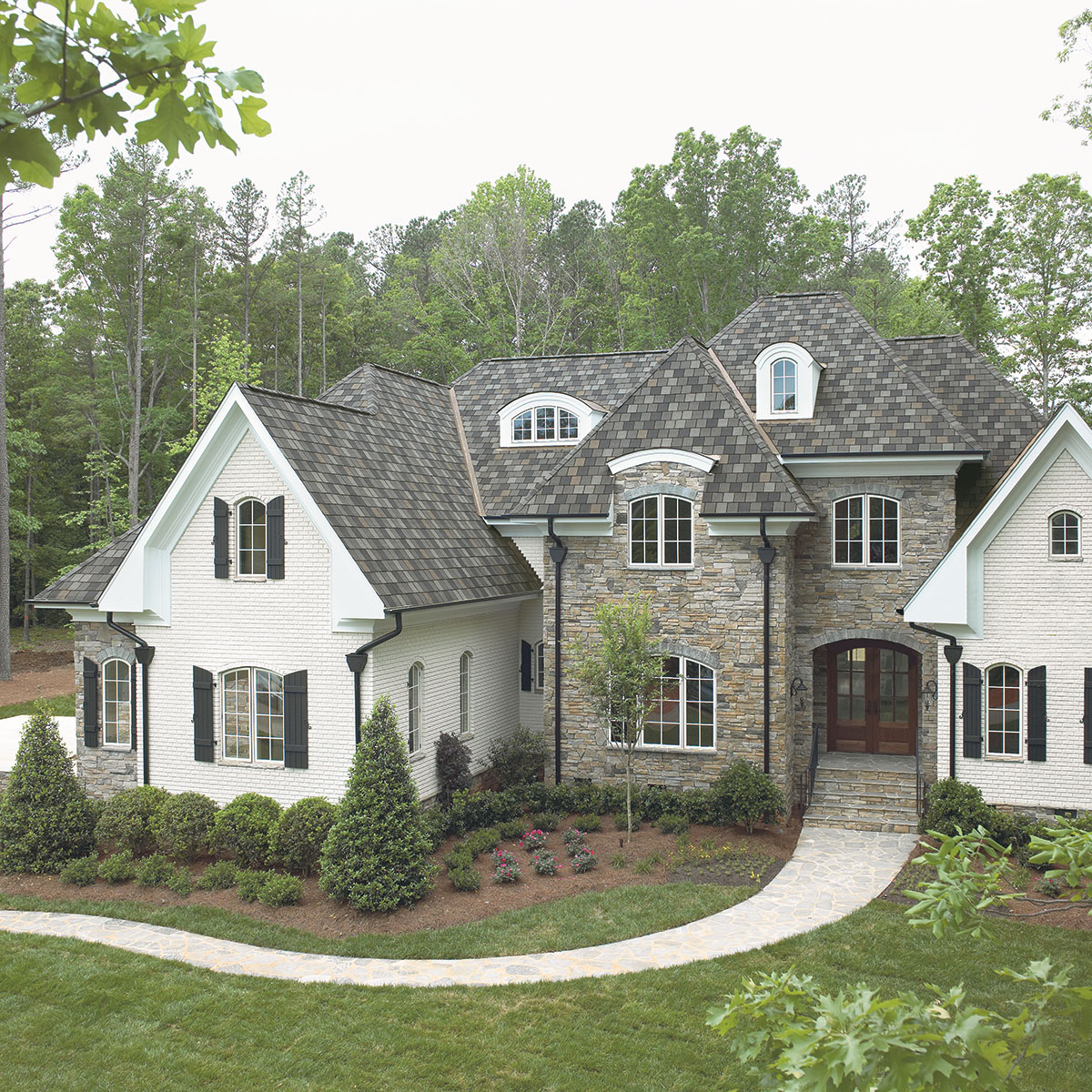 grey shingles to match a home that's grey, brown and white