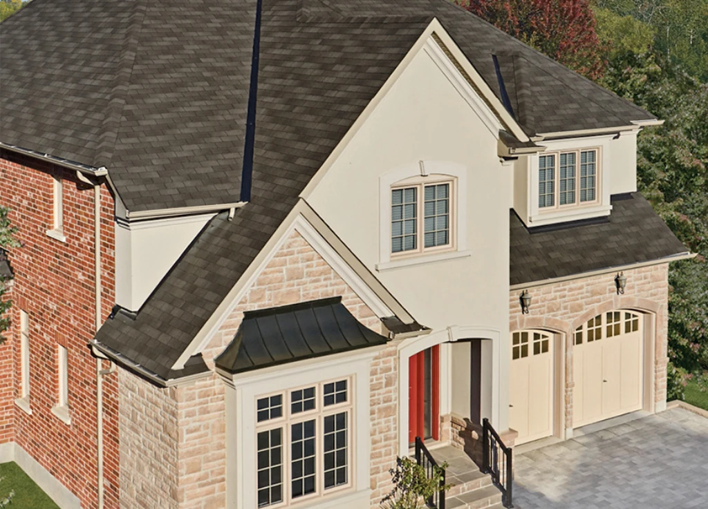 home with garage roofed with 3 tab shingles