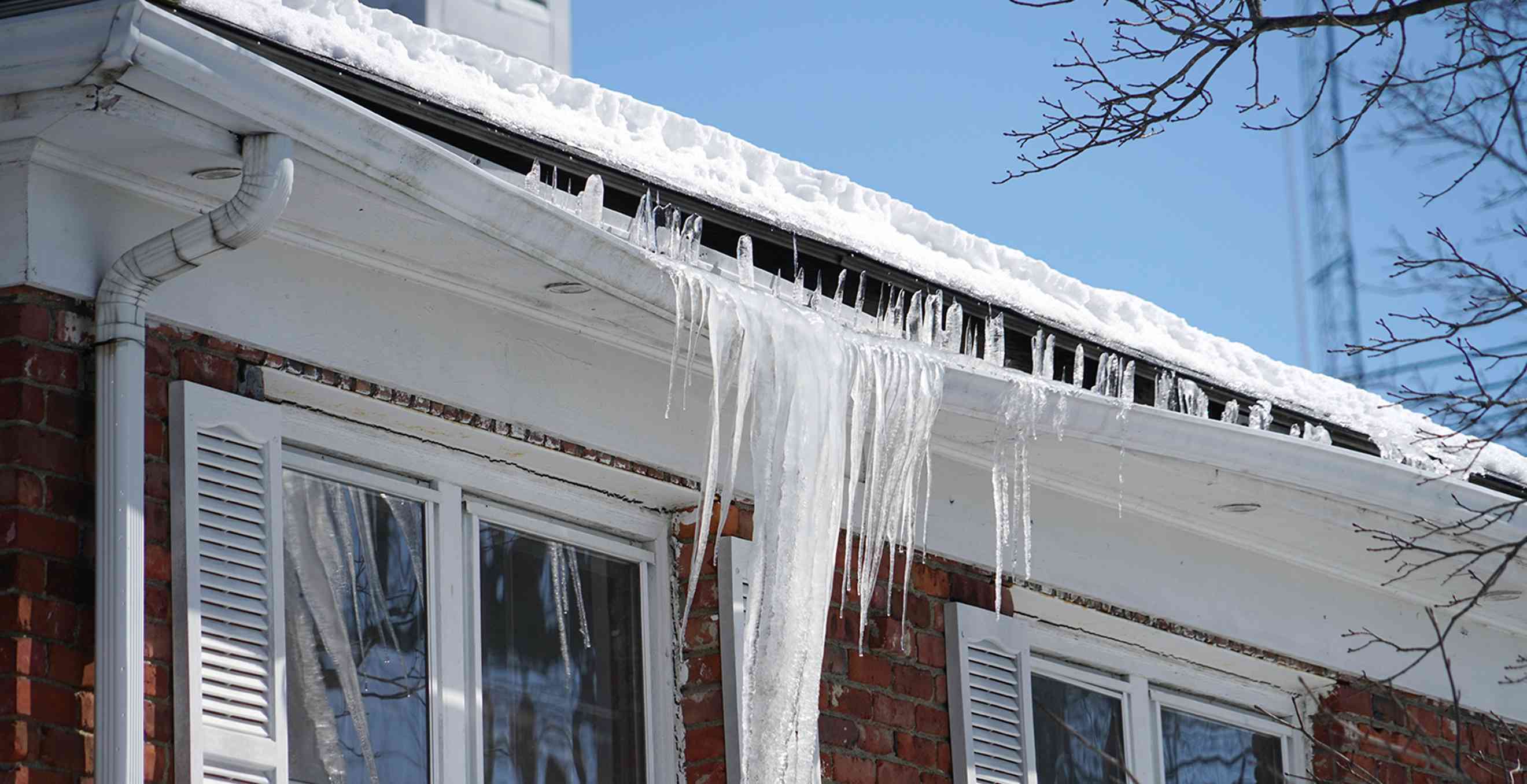 icicle on house roof and gutter