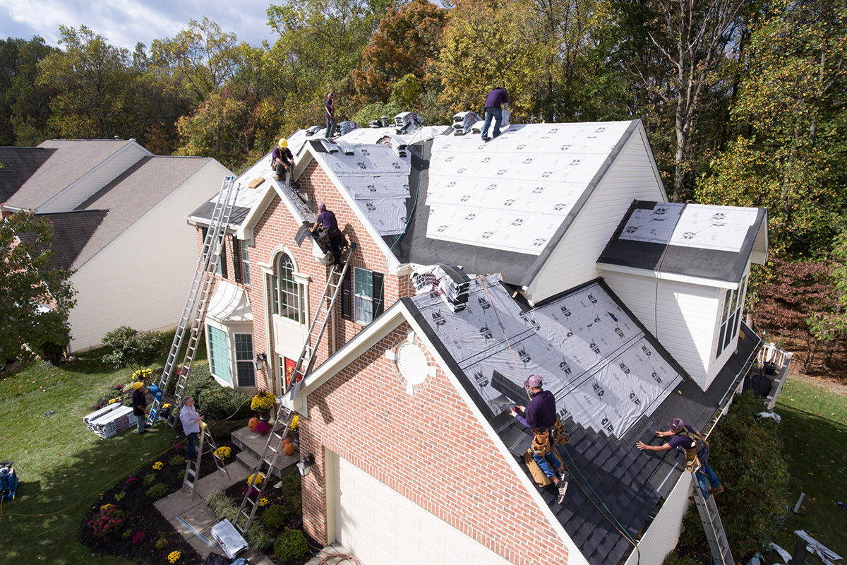 installing roof shingles