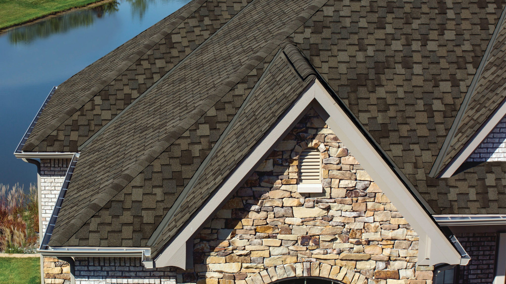 House with IKO Armourshake Shingles in Weathered Stone Roof