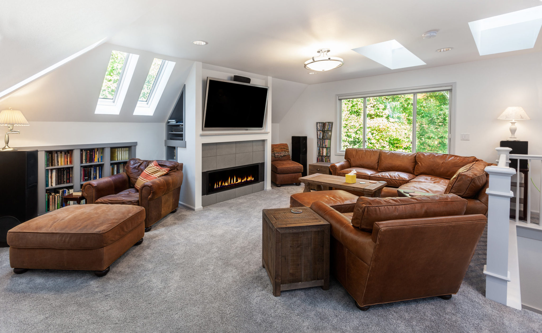 living room in a home with five skylights