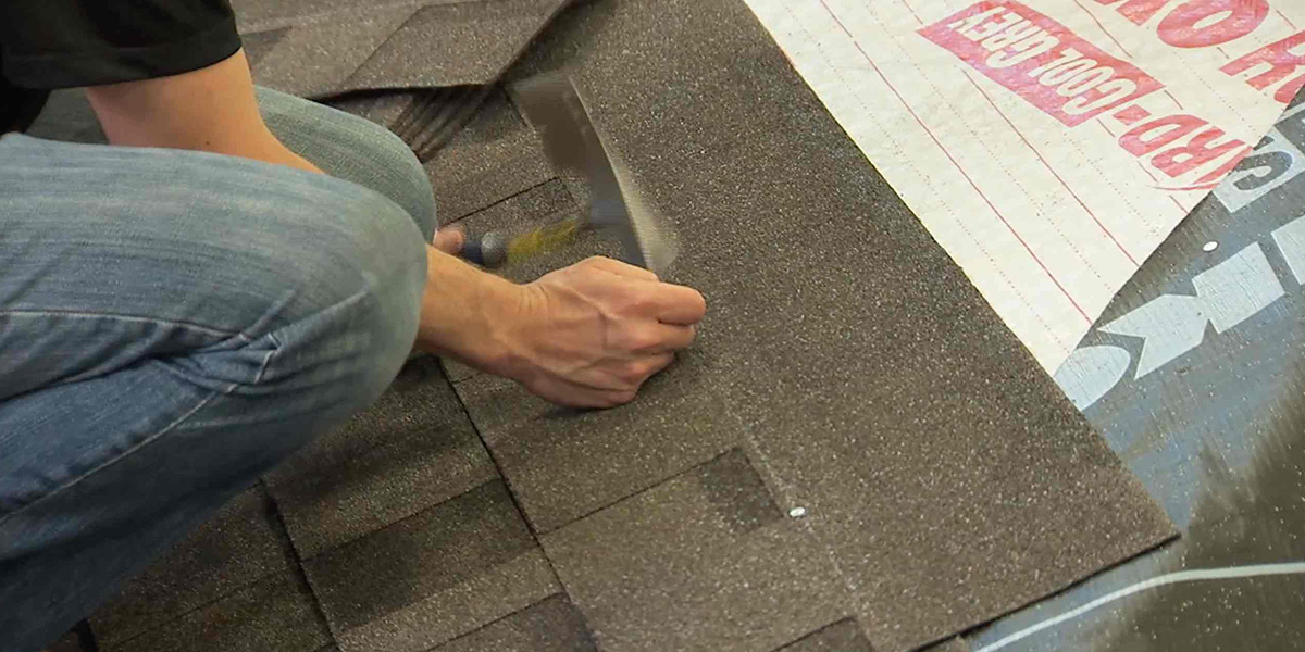 nailing architectural shingles on the nailing line