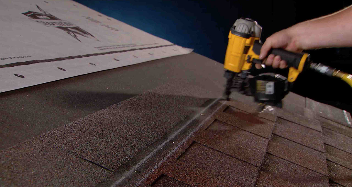 nailing shingles at the nailing line