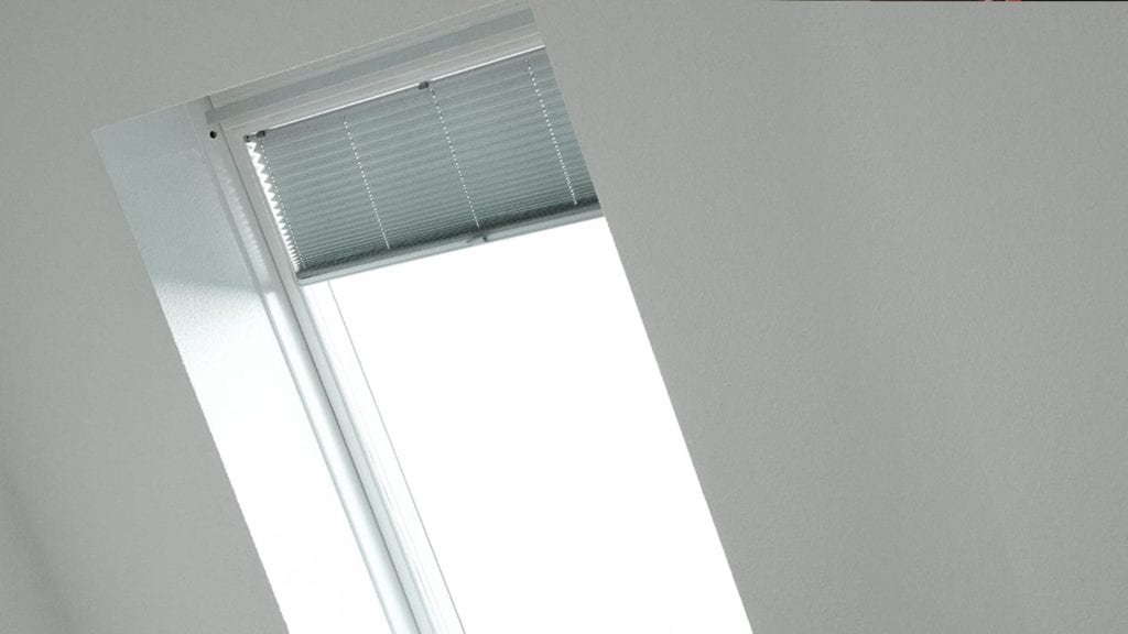 view from inside a home, blinds on a skylight