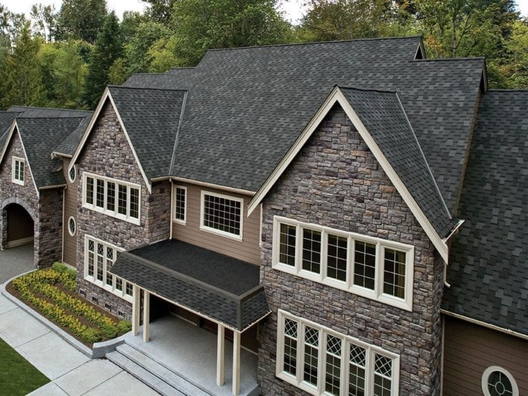 How to Tie in a Flat Roof With a Shingle Roof IKO